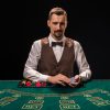A professional dealer hosting a live casino game