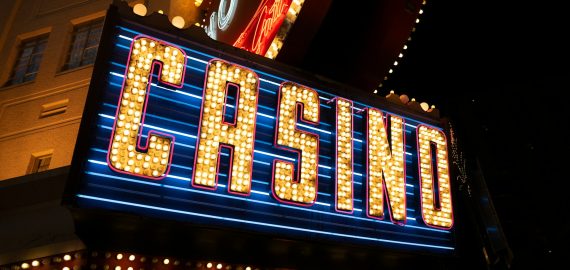 Mobile Casino Trends Sweeping Across East Asia_large | SistersSites.co.uk A yellow casino sign with blue lights